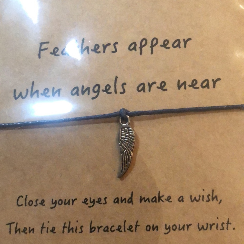NIP Leather Cord and Charm Tie on Bracelet
